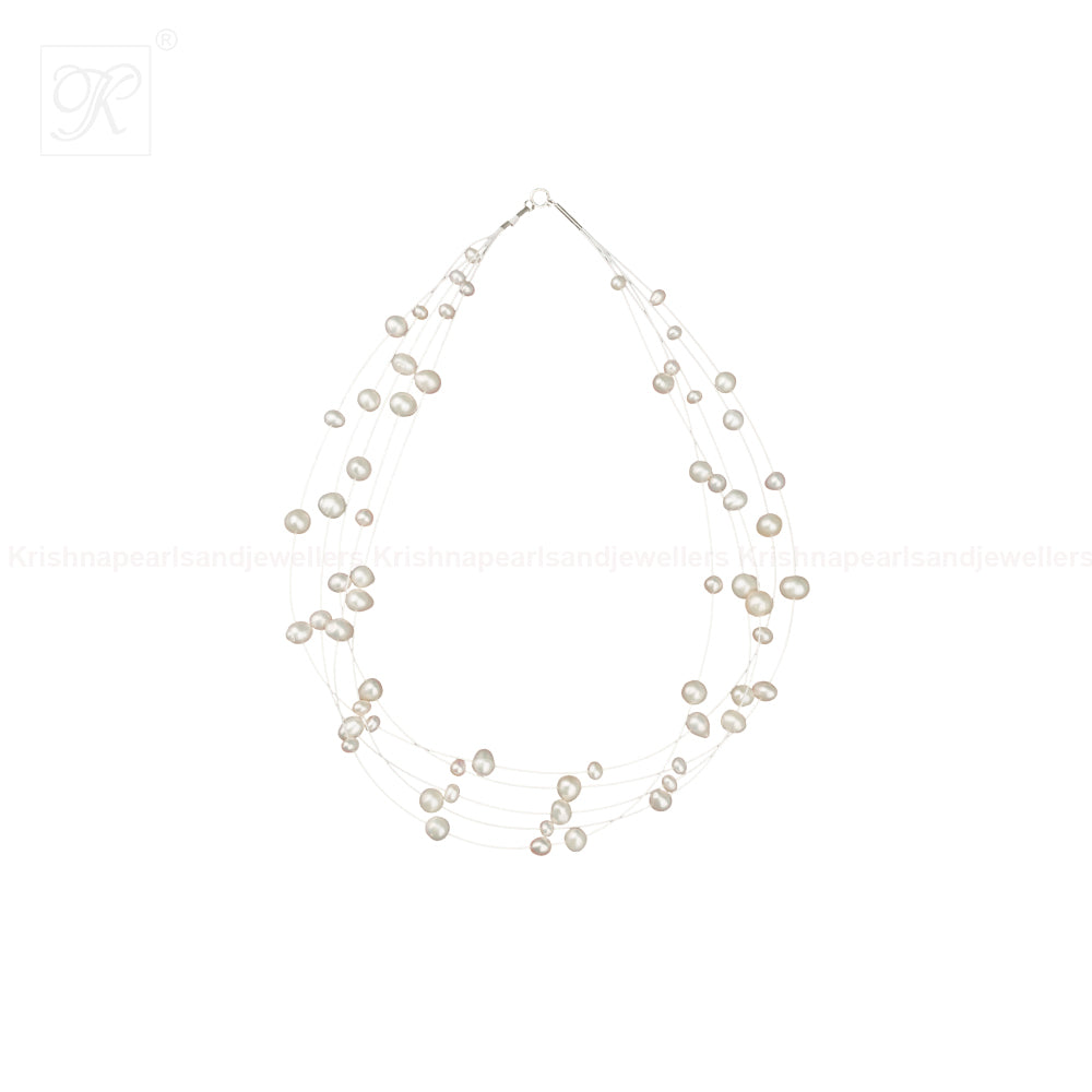 Whispers of Pearl: Floating White Pearl | Krishna Pearls and Jewellers