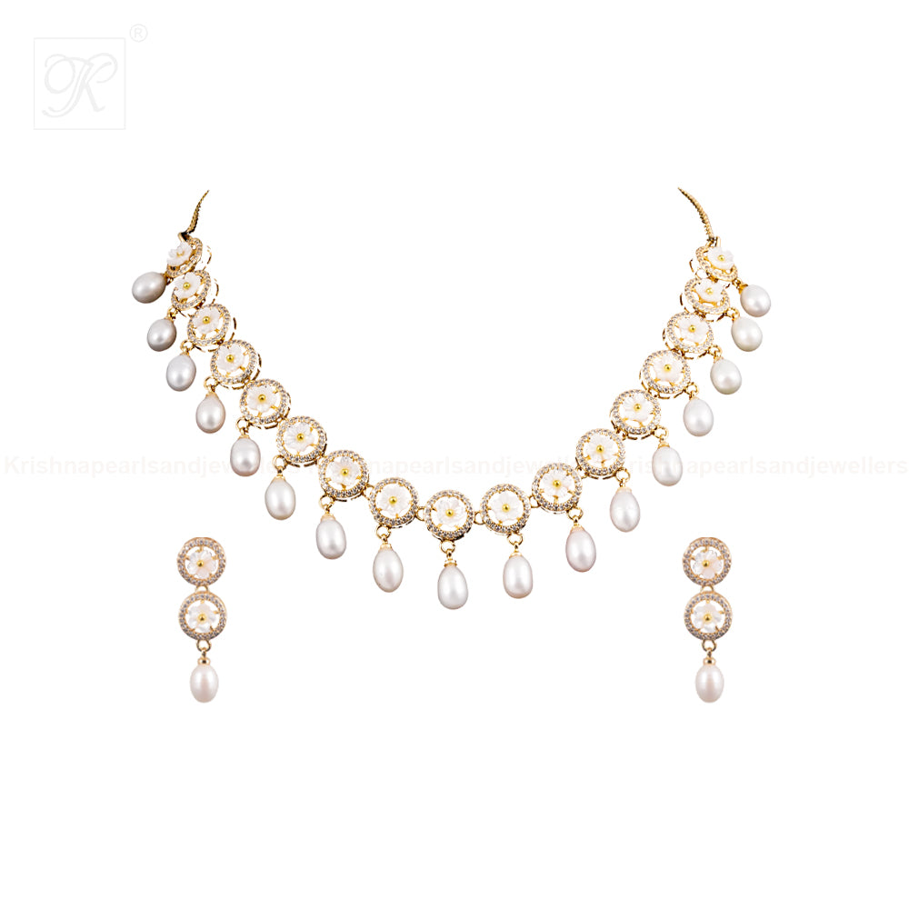 Delicate Crystal Bloom & Pearl Drop Jewelry | Krishna Pearls and Jewellers
