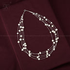 Whispers of Pearl: Floating White Pearl | Krishna Pearls and Jewellers