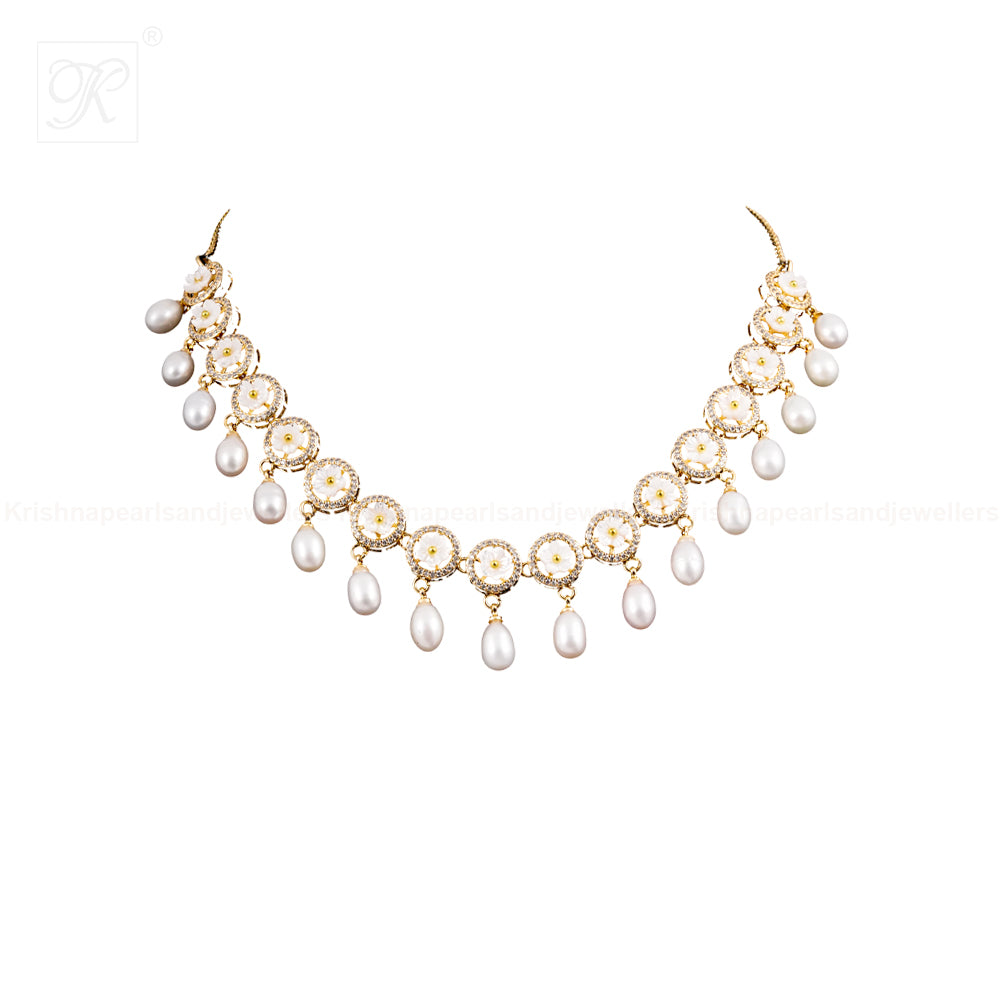 Delicate Crystal Bloom & Pearl Drop Jewelry | Krishna Pearls and Jewellers