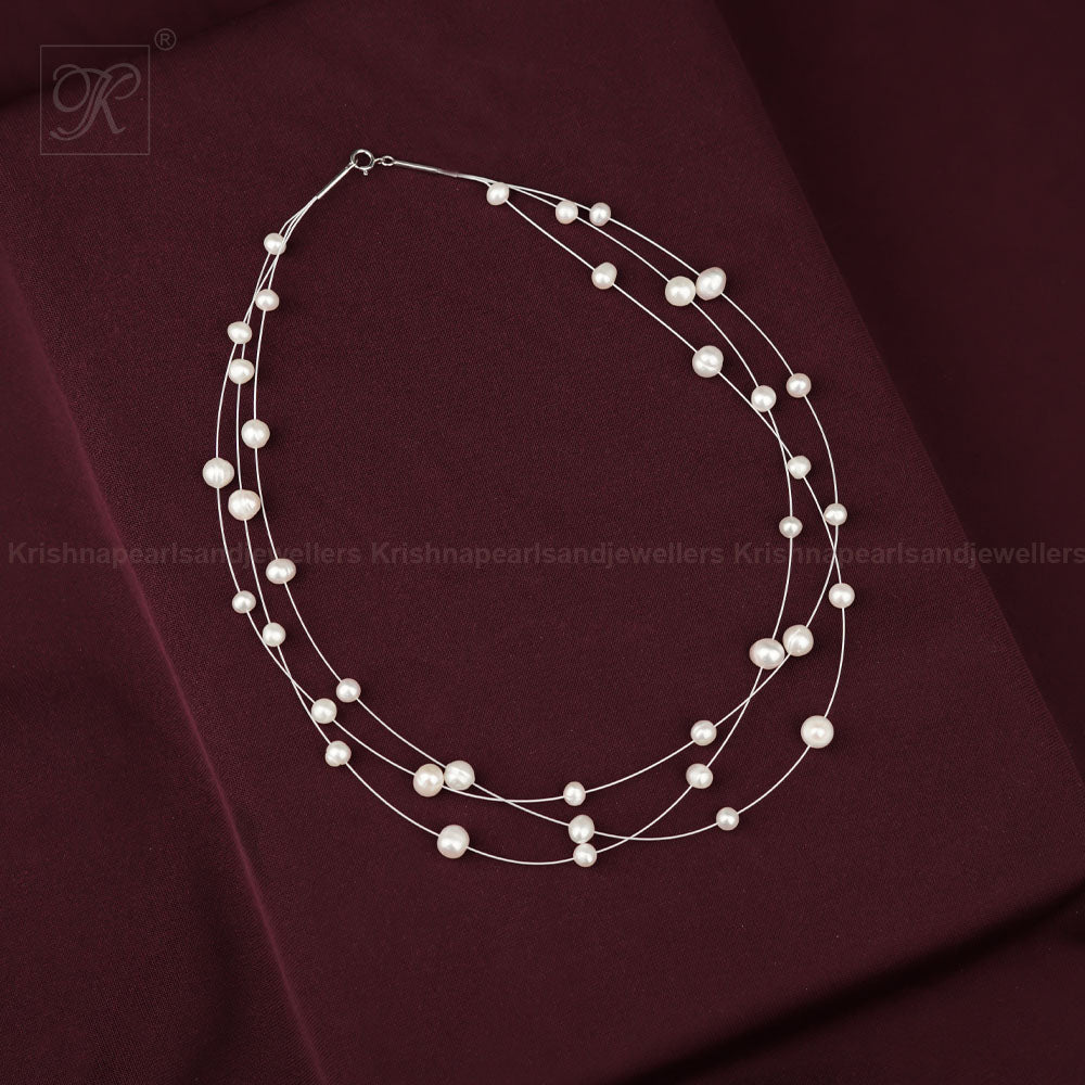 Floating Elegance: Illusion fancy string | Krishna Pearls and Jewellers