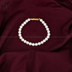 Golden Grace: Classic White Pearl Bracelet | Krishna Pearls and Jewellers