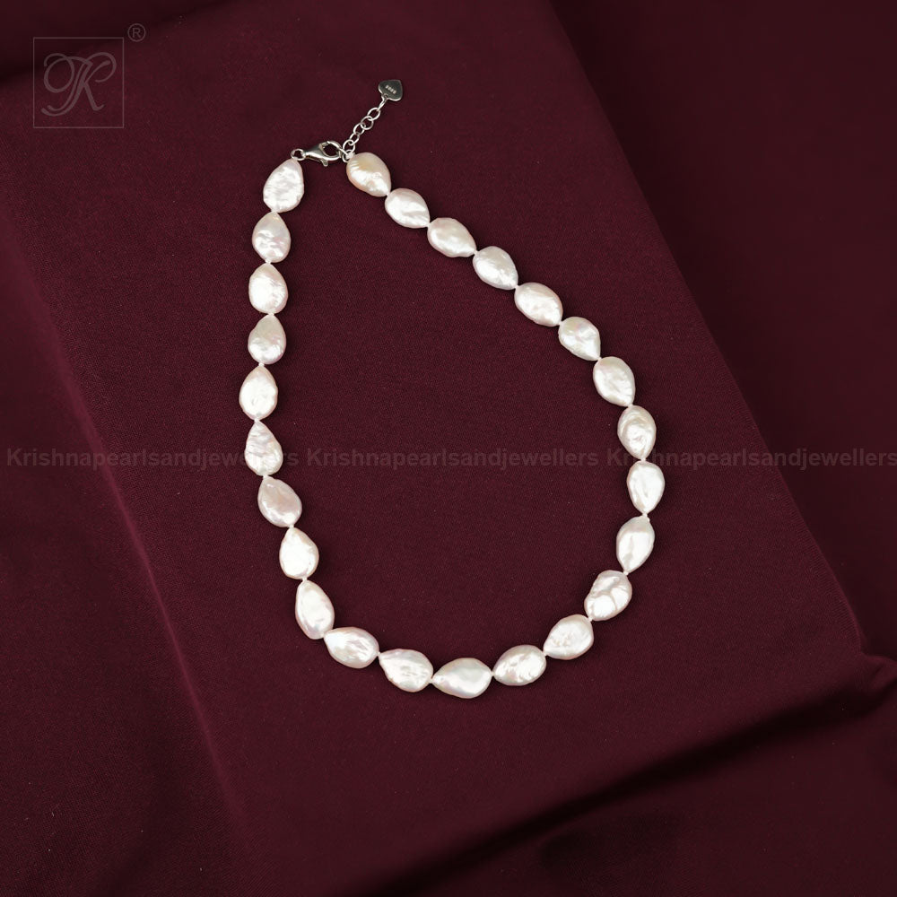 Sculpted Elegance: Irregular Silver Pearl | Krishna Pearls and Jewellers