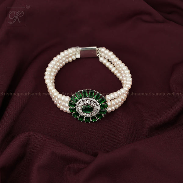 Emerald Bloom: Triple-Strand Pearl Bracelet | Krishna Pearls and Jewellers