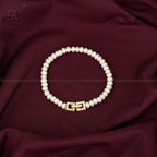 Golden Link: White Pearl Bracelet with | Krishna Pearls and Jewellers