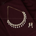 Delicate Crystal Bloom & Pearl Drop Jewelry | Krishna Pearls and Jewellers