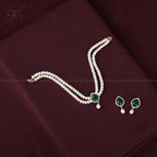Regal Pearl and Green Stone Choker Set | Krishna Pearls and Jewellers