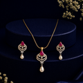 Grand Freshwater Pearl with CZ & Red Stone Earrings & Pendant Set in Gold | Pearl Jewellery Set | Krishna Pearls & Jewellers