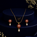 Elite Freshwater Pearl with Red Stone Earrings & Pendant Set in Gold | Pearl Jewellery Set | Krishna Pearls & Jewellers