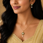 Majestic Freshwater Pearl with Green Stone Earrings & Pendant Set in Gold | Pearl Jewellery Set | Krishna Pearls & Jewellers