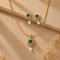 Majestic Freshwater Pearl with CZ & Green Stone Earrings & Pendant Set in Gold | Pearl Jewellery Set | Krishna Pearls & Jewellers