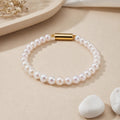 Golden Grace: Classic White Pearl Bracelet — view 1 — pearl jewellery — Krishna Pearls Hyderabad