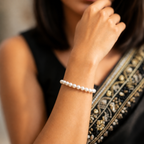 Golden Grace: Classic White Pearl Bracelet