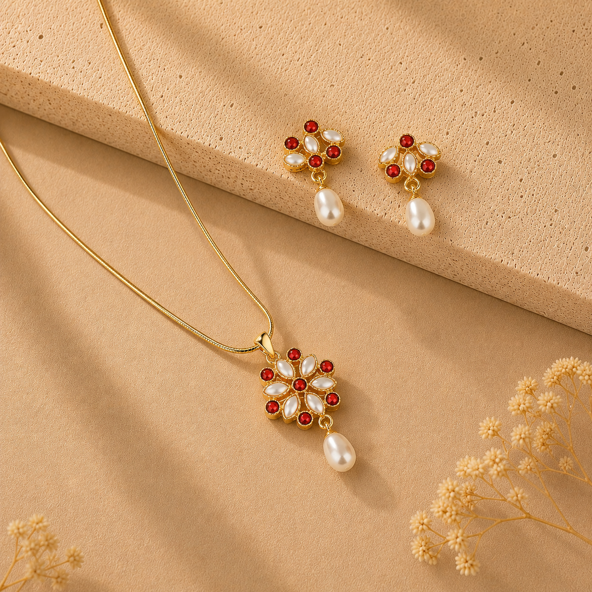 Pinnacle Freshwater Pearl with Red Stone Earrings & Pendant Set in Gold | Pearl Jewellery Set | Krishna Pearls & Jewellers